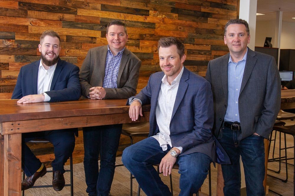 Russell Cellular is led by Jeven Russell, Nathan Mindeman, Robert Lister and Darin Wray. They’re shown here in May for Springfield Business Journal’s Dynamic Dozen awards.